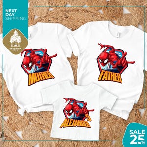 a couple of t - shirts with spiderman on them