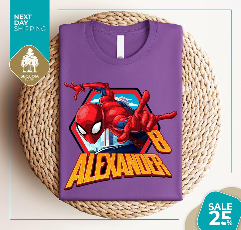 a purple t - shirt with a spiderman graphic on it