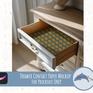 May include: A partially open white drawer with a patterned contact paper lining. The paper features a repeating design of orange and yellow floral shapes on a dark green background. The text "Drawer Contact Paper Mockup for Procreate Only" is visible.