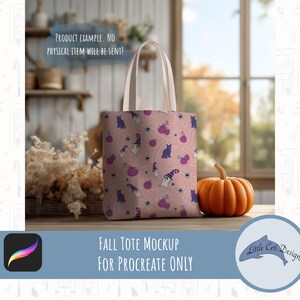 May include: A tote bag featuring a repeating pattern of purple cats, ghosts wearing witch hats, and purple pumpkins on a light pink background. The text "PRODUCT EXAMPLE. NO PHYSICAL ITEM WILL BE SENT!" is visible in the upper left corner of the image.