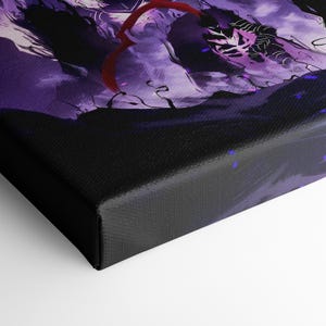 May include: Abstract art canvas print in shades of purple and black, with a red circular shape. The artwork is stretched and mounted on a wooden frame, ready to hang. The overall design is dynamic and modern, suitable for various interior styles.