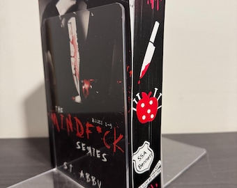 Mindf*ck series Omnibus by ST Abby with custom sprayed edge.