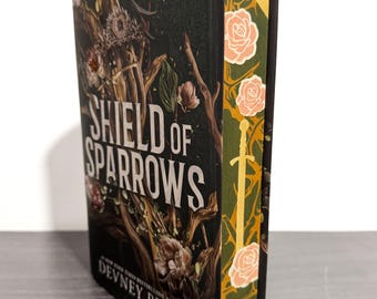 Shield of sparrows sprayed edge book. Custom order.
