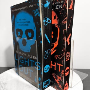 Lights out & Caught up sprayed edge book.