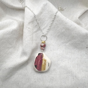 Sea pottery necklace. Unusual Boho piece of sea pottery colourful reds - yellows- Sterling silver chain -Jewellery gift for her birthday-
