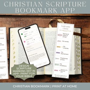Puede incluir: Una aplicación de marcadores de escrituras cristianas en la pantalla de un teléfono inteligente, sobre una Biblia abierta. Dos marcadores impresos con claves de escrituras codificadas por colores y el texto 'Look unto Christ' y 'My Scripture Key'.