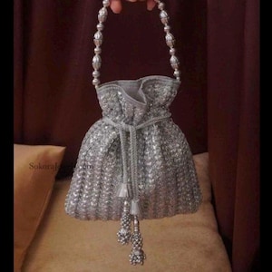 Heritage Silver Potli Bag with Heavy Copper tassels and Distinctive handle for Regalia outfits and Historical look - DARLA