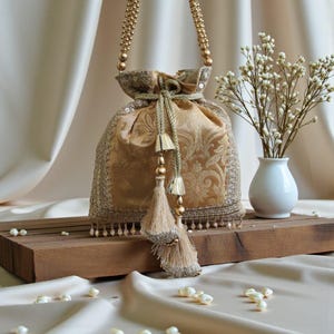 Caramel Gold Brocade Handbag with Drop Pearl Fringes, Top Handle and Designer Border Lacework for Wedding and Evening Parties - CLIO