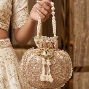 Ethnic Sequin handbag top handle bag for Festive Cultural outfits with Handmade pink gold threadwork and exceptional design - ALIZA