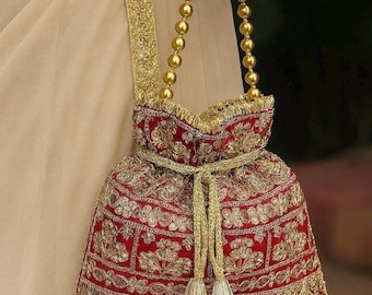 Zardozi Maroon Potli Bag with Handcrafted Detailed Golden Threadwork for Indian wedding Functions - MIRANA