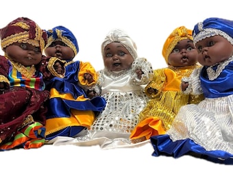 9-inch dolls, average size between Ibejis and Crawlers.