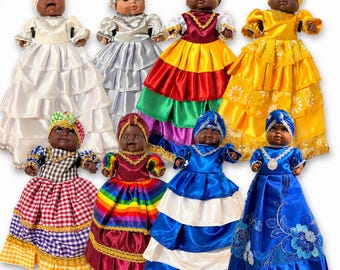 6-inch Ibeji dolls, females dressed in bright colors, symbolizing union and prosperity. Ibeyis jimaguas dolls. Female