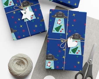 Santa being abducted by UFO wrapping paper