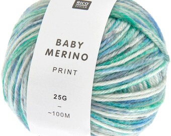 May include: A ball of Baby Merino Print yarn in shades of blue, green, and white. The yarn is labeled with the Rico Design logo, "Baby Merino Print", and the weight of 25g, approximately 100 metres.
