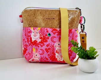 Bunnies pink shoulder bag. Cork bag with rabbits in bright pink.