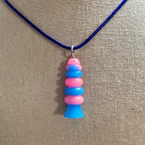 Glow Worm Lava Lamp Necklace: Pink & Blue Glow-in-the-Dark Design