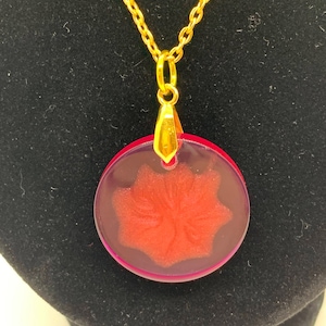 Pink Resin Pendant with a Red Mica Powder design