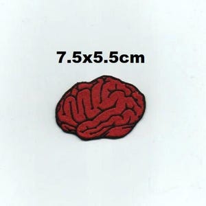 May include: Red embroidered iron-on patch of a human brain, measuring 7.5 x 5.5 cm.