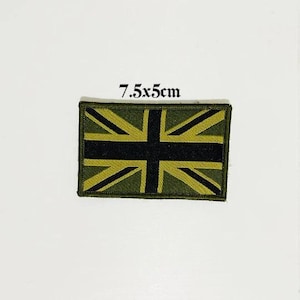 May include: A green and yellow embroidered patch of the Union Jack flag, measuring 7.5 by 5 centimeters.