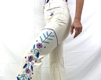 Vaqueros acampanados blancos bordados vintage de los años 70 y 1970