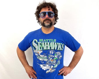 Vintage 90s Seattle Seahawks NFL Game Day Football Cartoon Nutmeg Tee Shirt Tshirt