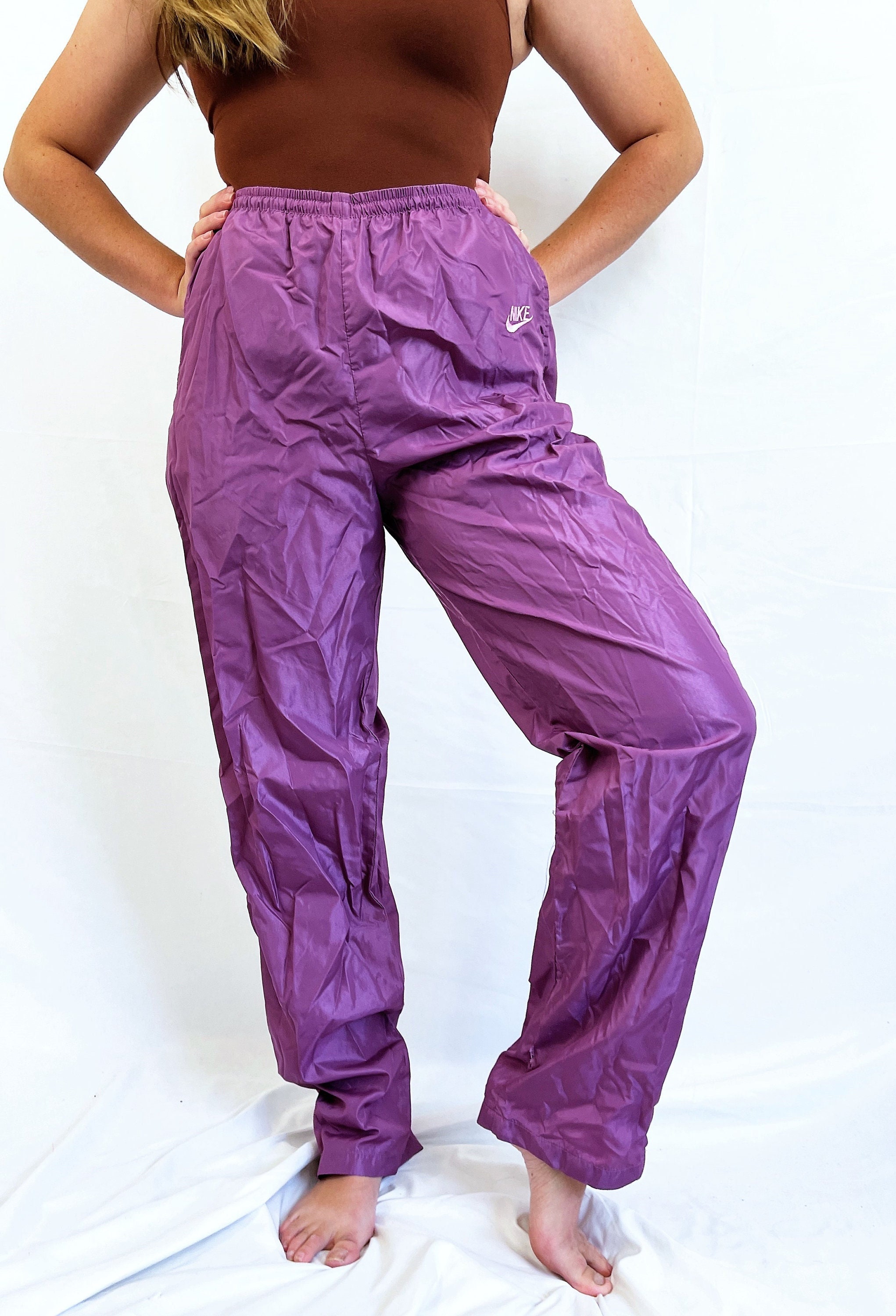 Purple windbreaker pants sale
