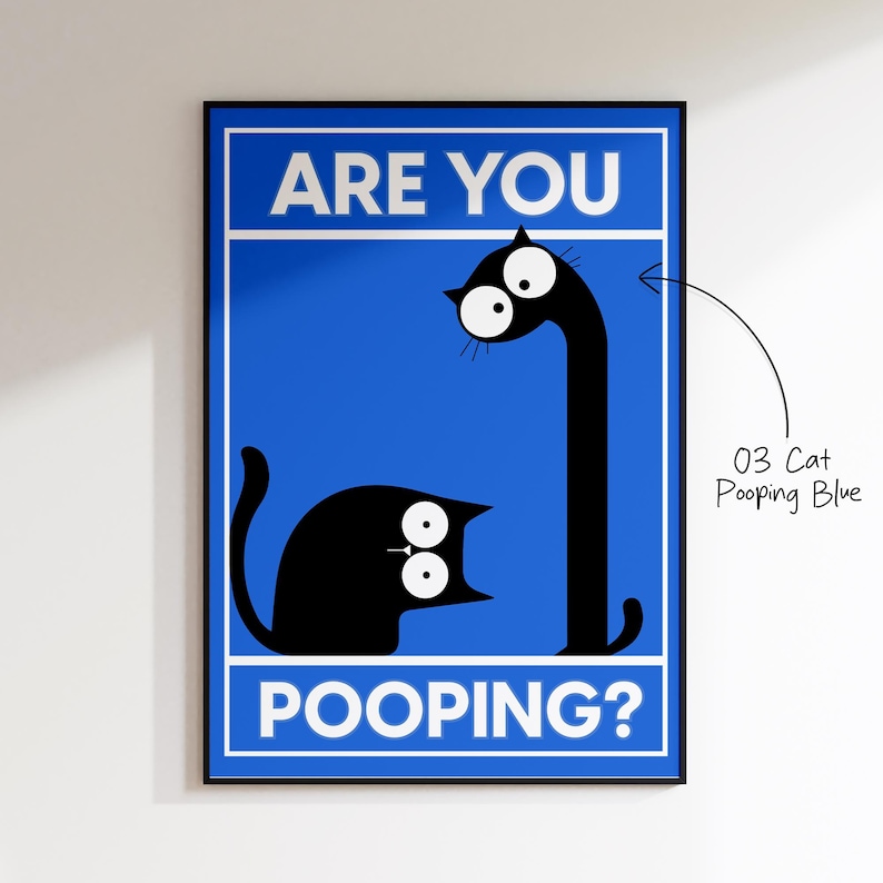 May include: A framed art print featuring a blue background with the text "ARE YOU POOPING?" in white. Two black cat illustrations are depicted, one in a sitting position and the other with an elongated neck. The art is titled "03 Cat Pooping Blue".