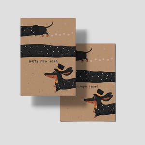 May include: Two greeting cards with a dachshund illustration. The dog is black with white polka dots and a top hat. The cards have the text "Happy New year!" on a tan background with a black dotted line.