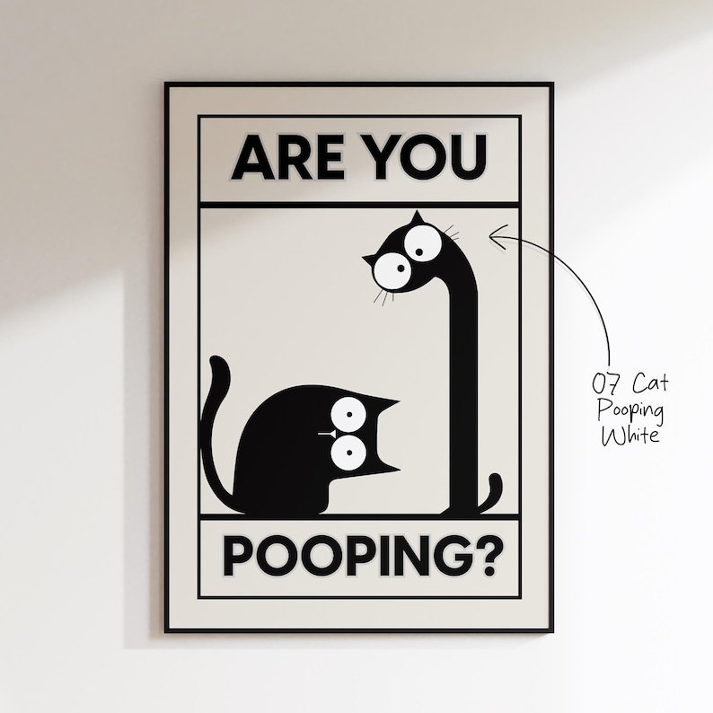 May include: Black and white framed art print featuring a cartoon cat with the text "ARE YOU POOPING?". The cat is depicted in a humorous pose, with one cat looking up at another cat with a long neck.