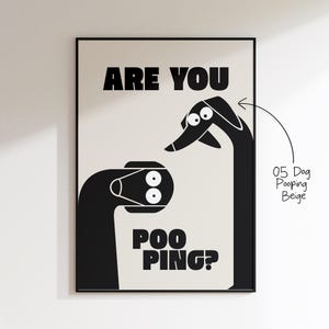 May include: Black framed art print with a beige background. The print features two stylized black dog illustrations with the text "ARE YOU POO PING?" in bold black letters. The art is labeled "05 Dog Pooping Beige".