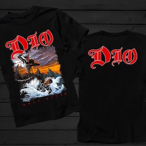 May include: Black t-shirt featuring the band name "Dio" in red gothic lettering on the front and back. The front graphic depicts a figure in the water with a person above, with the words "Holy Diver" below.