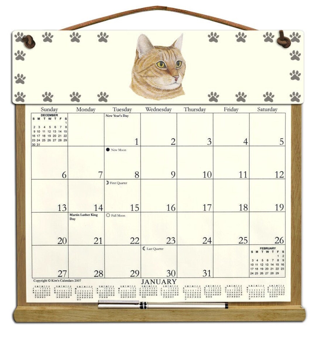 Orange Tabby Cat Calendar Holder Filled With a 2024 Calendar and