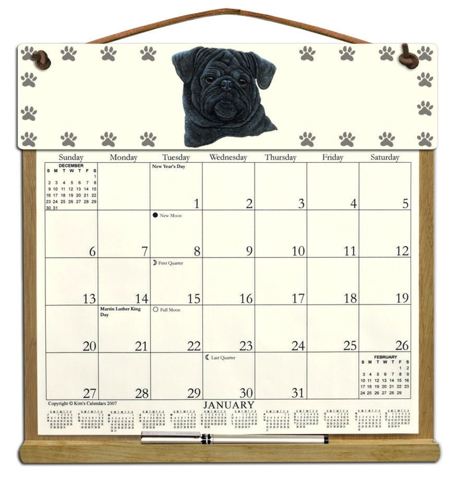 Black Pug Calendar Holder Filled With a 2024 Calendar and Includes an