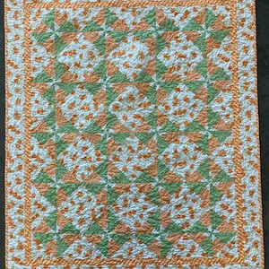 Orange and Green Pinwheels Patchwork Baby Quilt