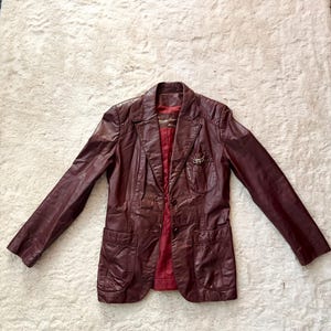 vintage etienne aigner burgundy leather jacket!