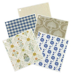 May include: Set of five patterned kitchen dishcloths. The cloths feature a variety of designs, including stripes, gingham, floral, and paisley. The cloths are all white with different colored patterns.