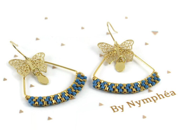 By Nymph\u00e9a blue woven triangles 24 carat gold plated butterfly Gold brass earrings miyuki delicas beads