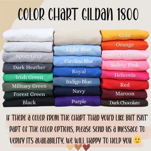 May include: A Gildan 1800 color chart displaying folded sweatshirts in various shades including white, ash, sport gray, dark heather, green tones, black, sand, blue tones, purple, gold, orange, pink tones, red, maroon, and dark chocolate.