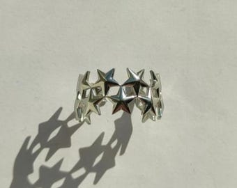 Anello a stella regolabile in acciaio inossidabile