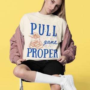 Camiseta con diseño de palito de mozzarella y queso, unisex, con colores cómodos, ideal para amantes de la comida, ideal como regalo de aperitivo o para jugar a tirar.