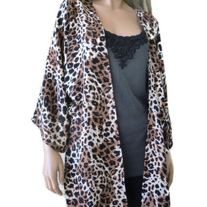 Dark and handsome leopard\animal print  kimono with wide sleeves, natural fibers 50&quot; inches wide,32.5&quot;  long ,one size