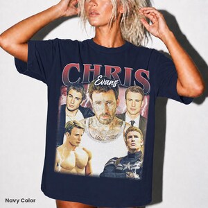 May include: Navy blue t-shirt featuring a collage of Chris Evans images with the name "CHRIS Evans" in a vintage style. The shirt showcases various photos of the actor, with a distressed aesthetic.