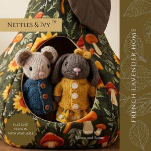 May include: A pear-shaped fabric house with a dark green mushroom and sunflower print containing a knitted mouse in a blue cardigan and a knitted bunny in a yellow cardigan. Text reads NETTLES & IVY, FRENCH LAVENDER HOME, and 15cm Mouse and Bunny.