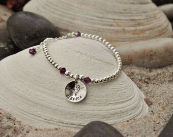 Beaded charm bracelet.     Personalize with an initial, word, name, or design!