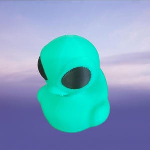 May include: A bright turquoise alien figurine with black eyes. The alien is in a sitting position with its head tilted down.