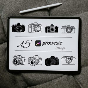 May include: A digital tablet screen displaying 45 black and white camera stamps for the Procreate app. The text "45 Procreate Stamps" is displayed on the screen.