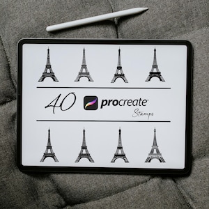 May include: A digital tablet screen displaying 40 black and white illustrations of the Eiffel Tower. The text "40 procreate Stamps" is displayed on the screen.