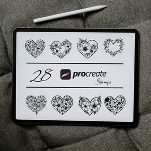 May include: A digital tablet screen displaying 28 black and white floral heart designs. The text "Procreate Stamps" is displayed on the screen.