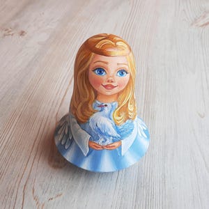 Angel girl music wooden wobble toy doll hand painted – Nevalyashka Doll Roly-Poly with pigeon