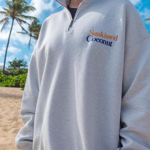 Sunkissedcoconut Logo Embroider Zip Sweatshirt, Sunkissed embroidered sweatshirt, Sunkissed Beach Shirt, Zip-up Sweatshirt Custom